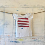 Sopra e sotto le righe La maglietta da donna.