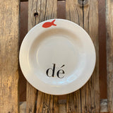 dé Il piatto con il pesce